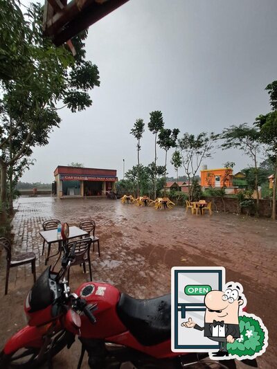 Enjoy the view at the outside area of Mid Way Cafe(car wash)