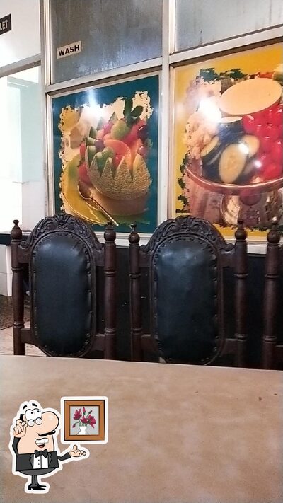 Take a seat at one of the tables at Omega Family Restaurant