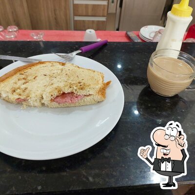 Sente em uma das mesas no Churrascaria Saretto