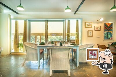 Take a seat at one of the tables at The Fig Tree Place