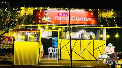 Take a seat at one of the tables at Azeez food corner