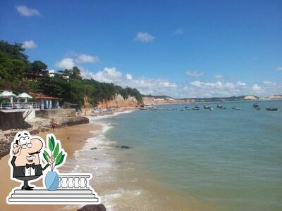 Você pode espairecer no na área externa do Caxangá Restaurante