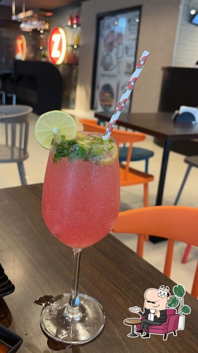 Take a seat at one of the tables at Zippyfeed restaurants - Vapi