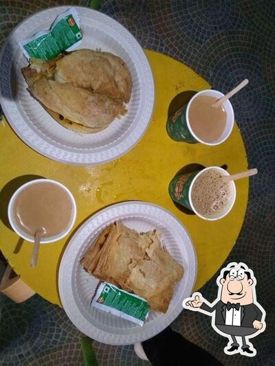 Take a seat at one of the tables at Chai Stop