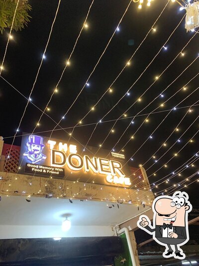 Take a seat at one of the tables at The Doner Cafe