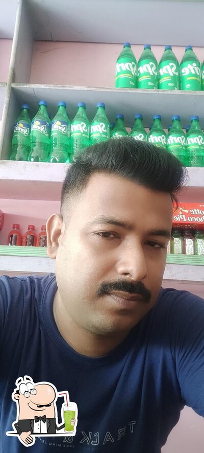 Enjoy a drink at Ghosh Sweets