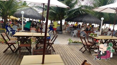 Sente em uma das mesas no Restaurante Jivanete