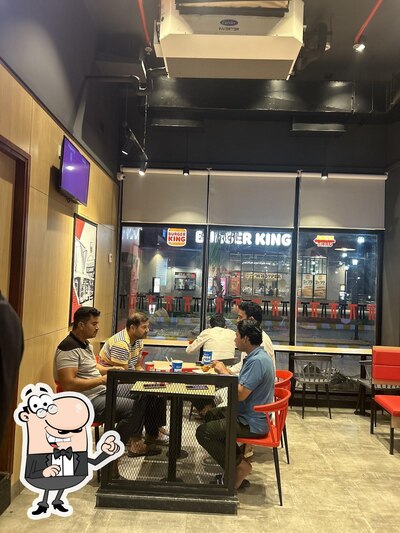 Take a seat at one of the tables at KFC