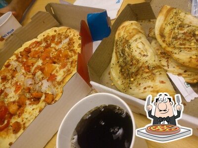 Try out pizza at Domino's Pizza