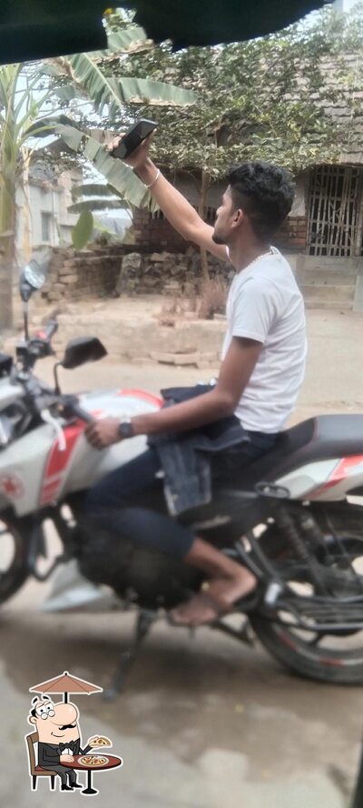 Check out how ঘটকের চপ সেন্টার looks outside