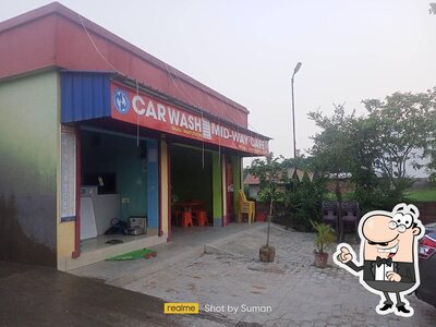 The outside area is an important feature of Mid Way Cafe(car wash)
