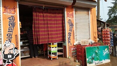 Check out how শ্রী দূর্গা মিষ্টান্ন ভান্ডার looks inside
