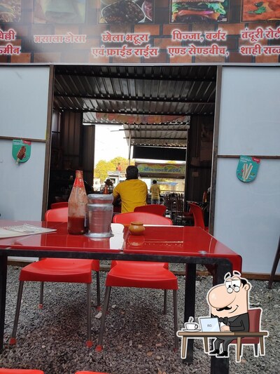 Take a seat at one of the tables at Shree Nath Pav Bhaji