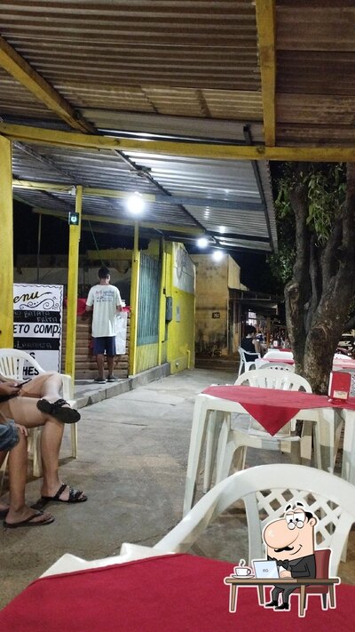 O interior do BELL LANCHES & PIZZARIA Fast Food Service