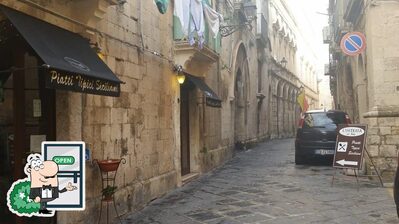 Curiosa tra la parte esterna di L' Osteria Da Seby