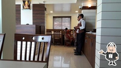 Take a seat at one of the tables at Murali Pure Veg