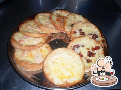 Platos en Tuba Pizzaria