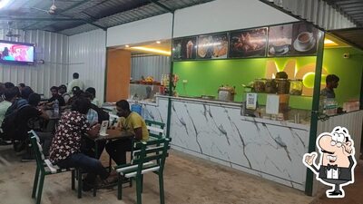 Take a seat at one of the tables at Mc cafe