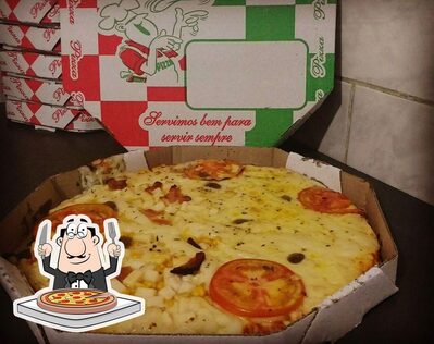 Escolha pizza no Pizzaria Colonia