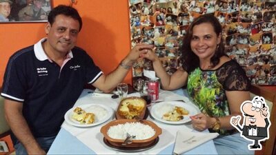 Sente em uma das mesas no Bar do K-pixaba