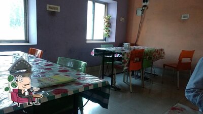 Take a seat at one of the tables at Rosai Restaurant