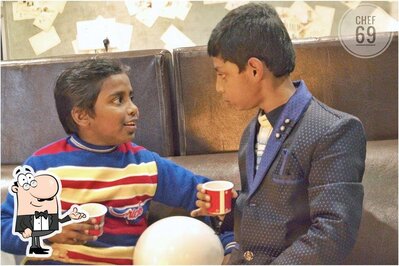 Take a seat at one of the tables at Chef 69 Lucknow