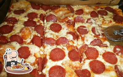 Prenditi una pizza alla pizzeria Pizza Taxi