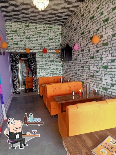 Take a seat at one of the tables at Prembala cafe