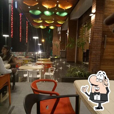 Take a seat at one of the tables at Chakki Bakki
