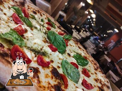 A Grande Roma Baldushk, vous pouvez profiter des pizzas