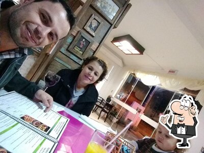 Veja imagens do interior do Pizzaria E Petiscaria Moda Da Casa
