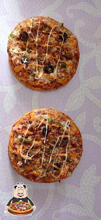 Get pizza at Krishna Nashta center