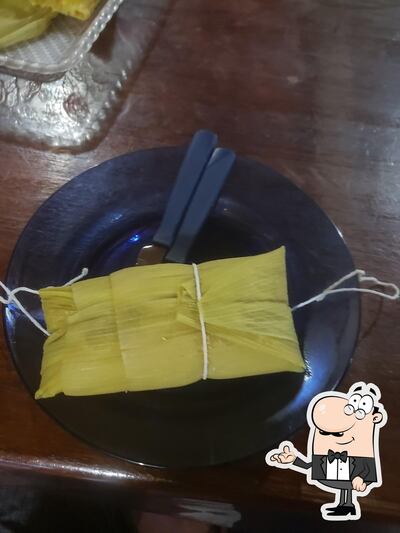 Sente em uma das mesas no Minas Pamonharia