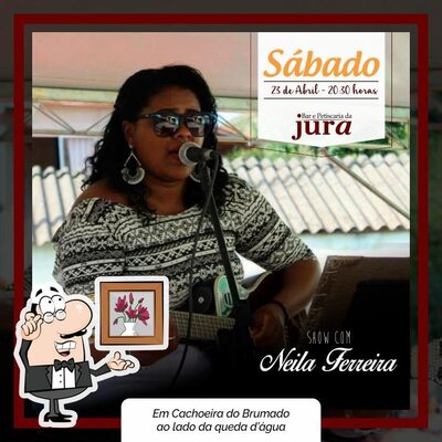 Sente em uma das mesas no Bar e Petiscaria da Jura