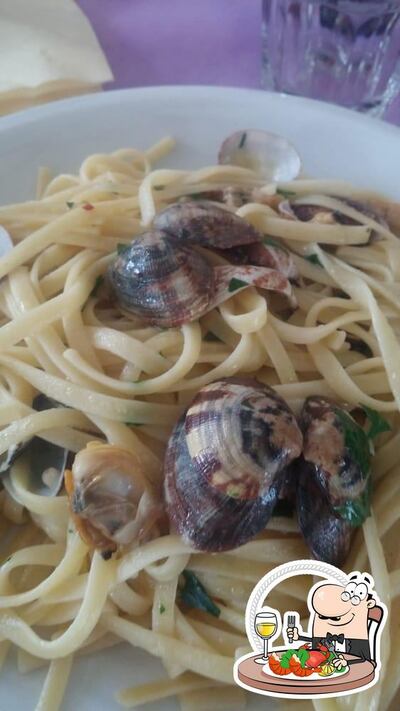 Degusta i sapori della cucina di mare alla pizzeria L'Arca