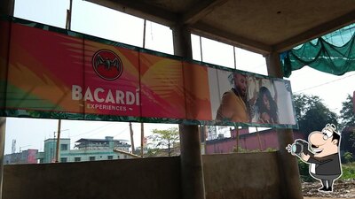 The advertisement displays information about F L OFF Shop