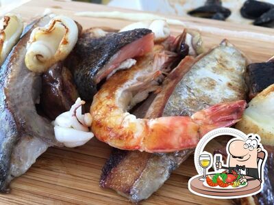 I clienti di Sabbia Bianca Rimini Ristorante possono godersi diversi prodotti di cucina di mare