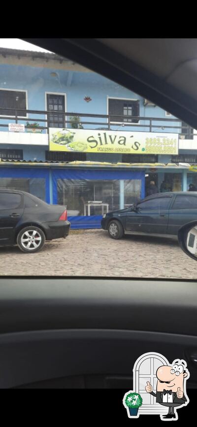 Você pode espairecer no na área externa do Silvas Frango Assado