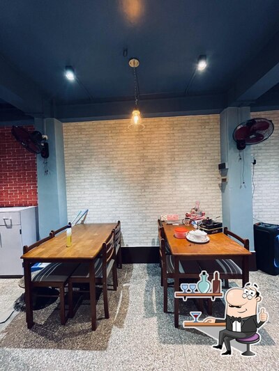 Take a seat at one of the tables at PRADHAN'S RESTAURANT