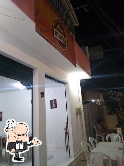 O interior do PIZZARIA ALTAS HORAS