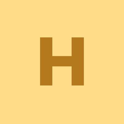 The logo of HOTEL HOMELAND BAKERY