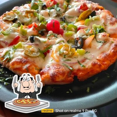 Try out pizza at Prime Time Cafe