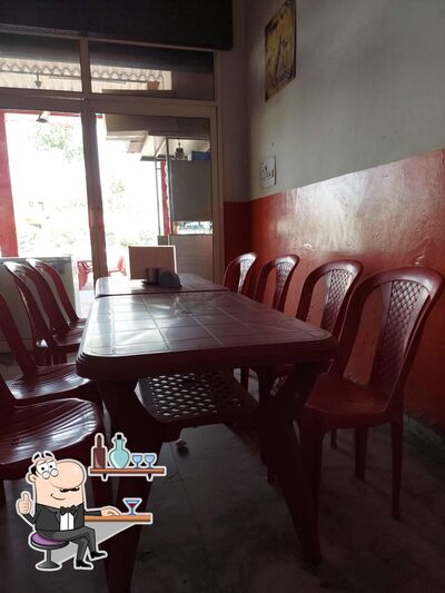 Take a seat at one of the tables at श्री बालाजी tourist dhaba