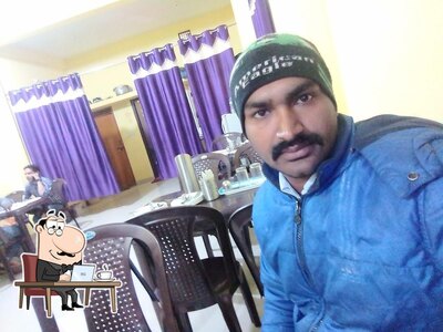 Take a seat at one of the tables at Anapurna bhojnalay SHANTI NAGAR MHOW