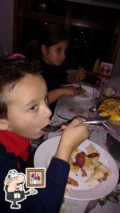 O interior do Pizzaria Barcello's