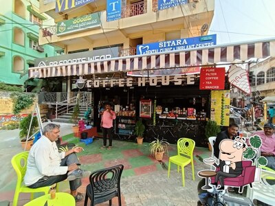 Take a seat at one of the tables at COFFEE HOUSE