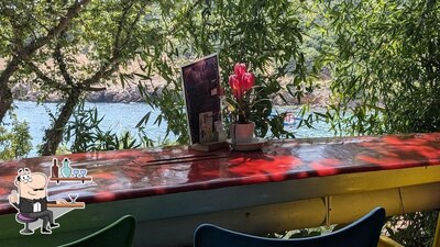 Dai un'occhiata agli interni di Beach Bar & Grill Max