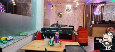 Take a seat at one of the tables at KAKA'S KABAB N KITCHEN