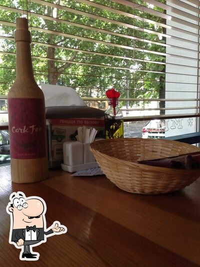 Take a seat at one of the tables at Trattoria Pesto Azzurro