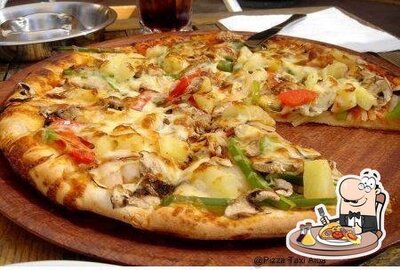 Ordina una pizza alla pizzeria Pizza Taxi